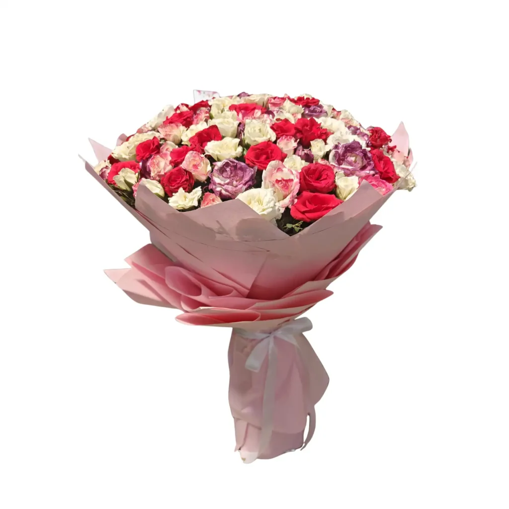 A vibrant bouquet featuring red and pink roses arranged elegantly in a decorative vase.
