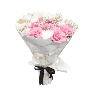 A bouquet featuring pink carnations and delicate white flowers arranged harmoniously.