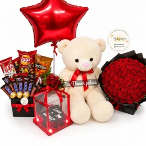 Luxury Valentine's gift hamper in Pakistan with a teddy bear, red rose bouquet, chocolates, snacks, star balloon, and romantic gift box for her.