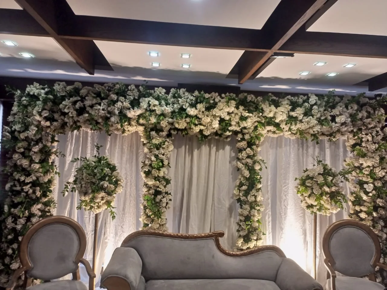 All-White Floral Arch Wedding Stage