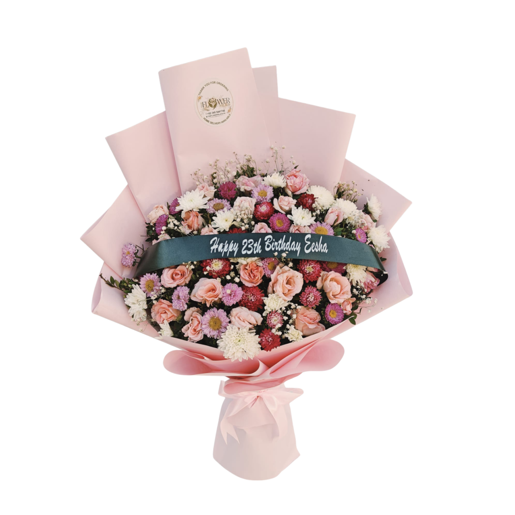 A bouquet of pink and white flowers tied with a ribbon, showcasing a vibrant and elegant floral arrangement.